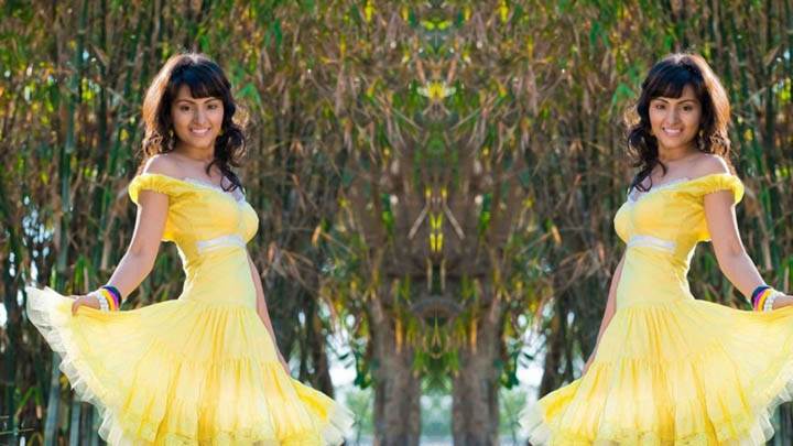 Sapan Saran In Yellow Dress Posing In Park