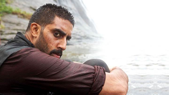 Abhishek Bachchan Is Sitting Near Rock Movie Raavan
