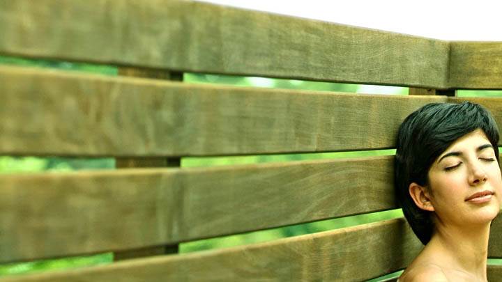 Girl Standing Near Wooden Brick N Closed Eyes