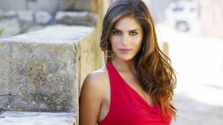 Anahi Gonzales In Red Dress Looking At Camera