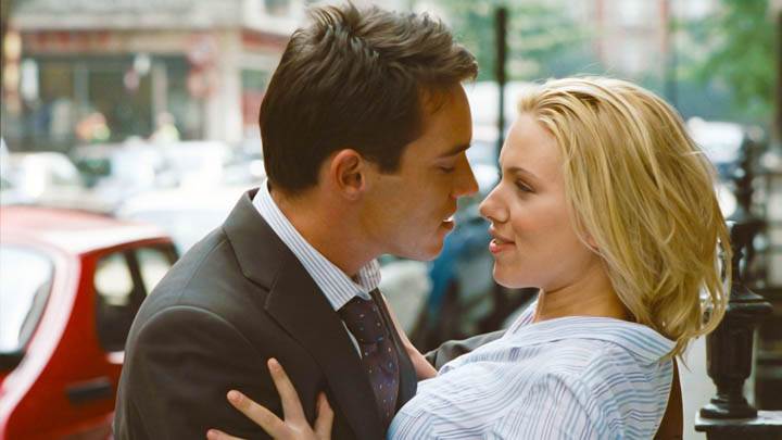 Match Point Couple Kissing on Road