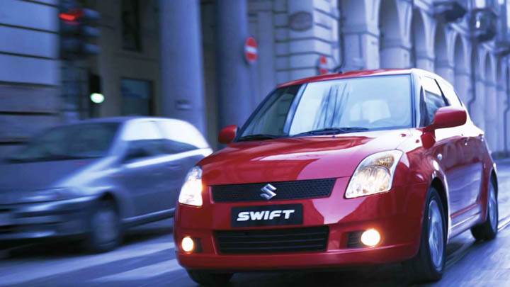 Suzuki Swift Red Sport Car On Street