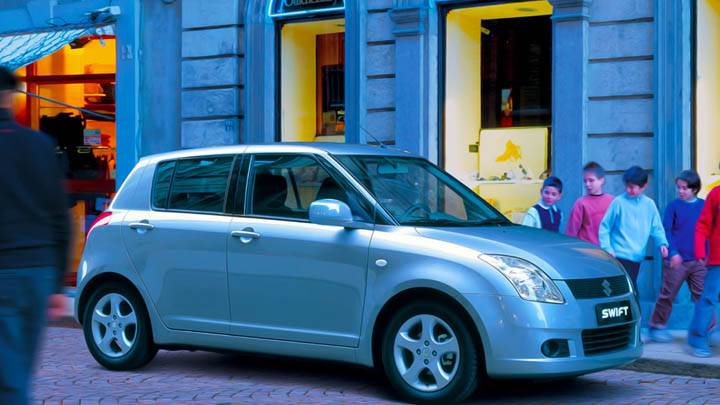 Suzuki Swift Sport Outside Restaurant in Green Blue color