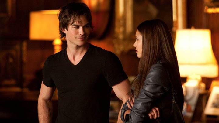 Damon Talking with Elena in Library