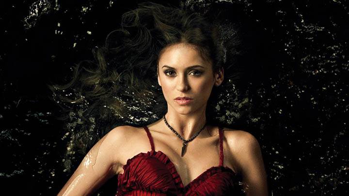 Elena in Red Dress Laying in Water
