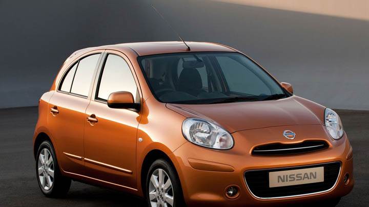 Orange Nissan Micra Tekna 2011 Side Front