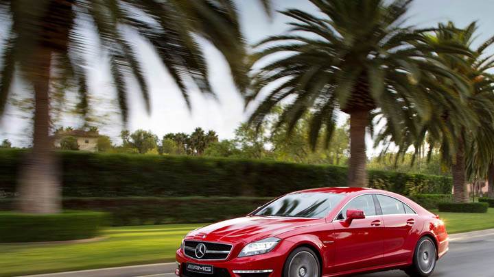 Red Mercedes-Benz CLS63 AMG 2012 Running on Highway