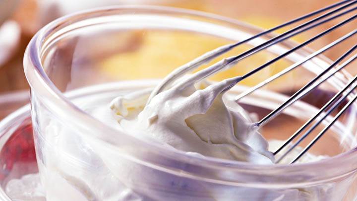 Stirring Cream in Glass Bowl