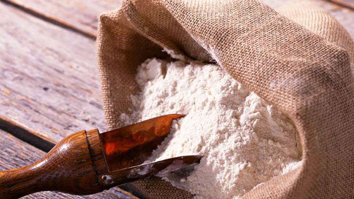 Taking Flour From Bag