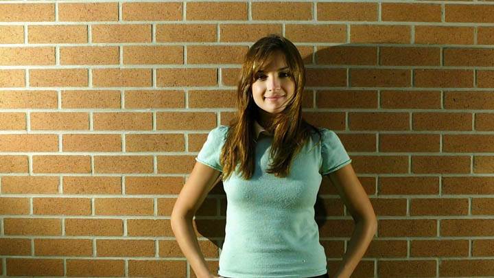 Rachael Leigh Cook Green Sweater Smile Black Jeans