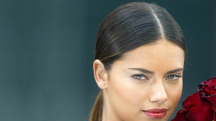 Adriana Lima With Red Roses And Face Closeup
