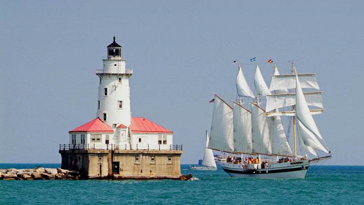Tall Ship Windy Sails Past the Chicago Harbour Lighthouse