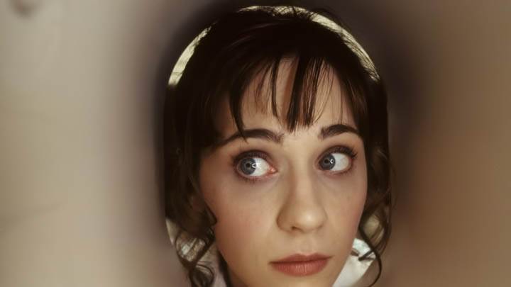 Zooey Deschanel Spying On Someone