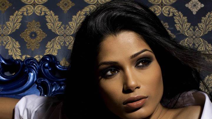 Freida Pinto Glossy Lips & Brown Eyes Face Closeup