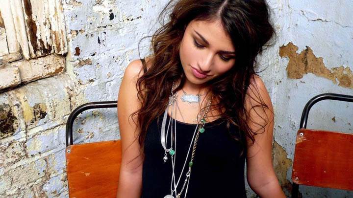 Gabriella Cilmi Closed Eyes & Sitting Pose