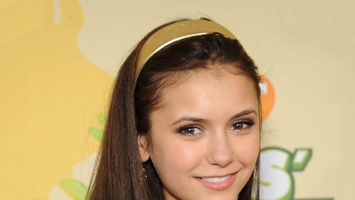 Nina Dobrev Smiling & Wearing Golden Hairband
