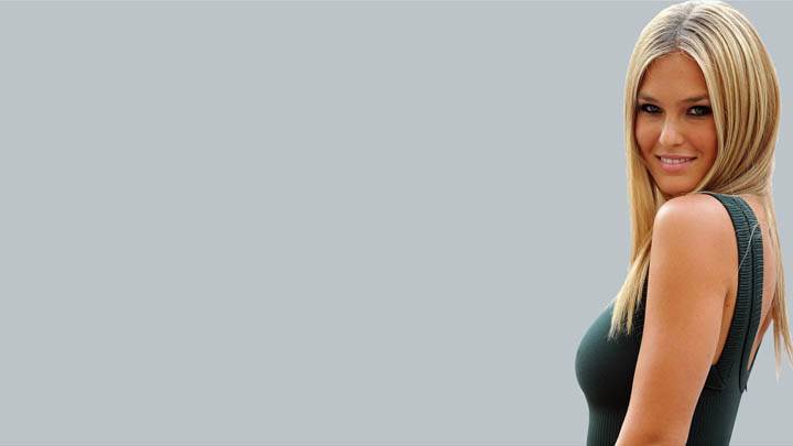 Bar Refaeli Smiling in Green Dress Side Pose