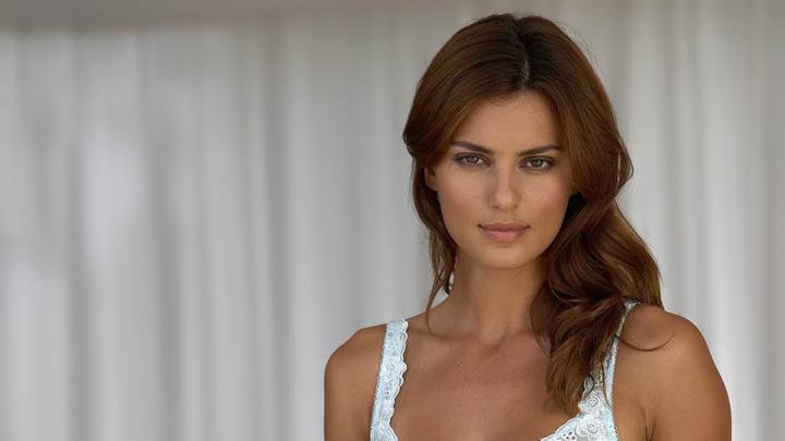 Catrinel Menghia Smiling In White Bikini Photoshoot