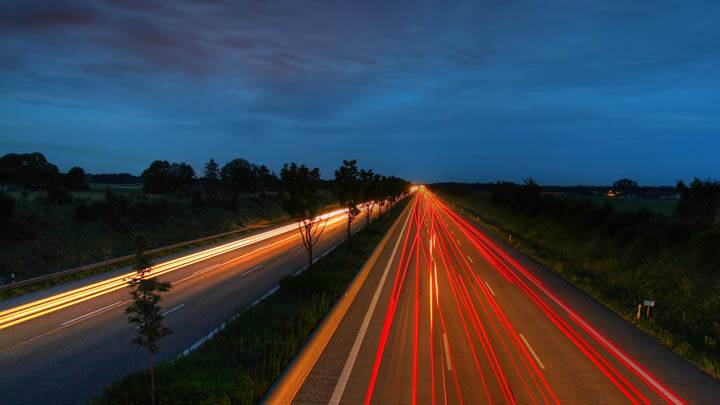 Red Led Lights On Highway At Evening