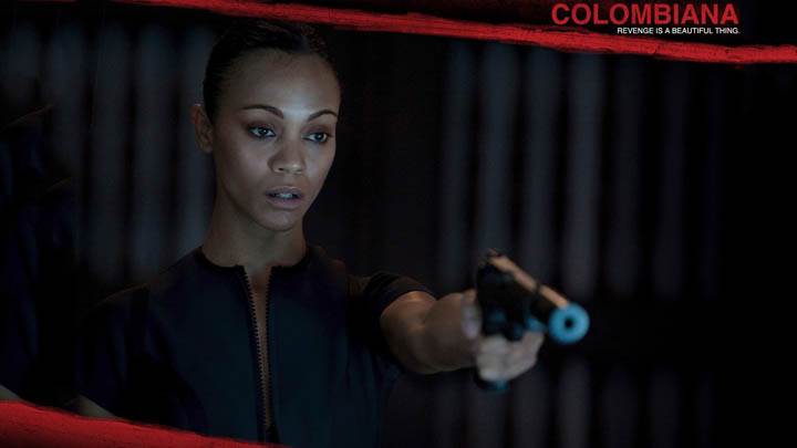 Zoe Saldana Holding A Gun In Colombiana