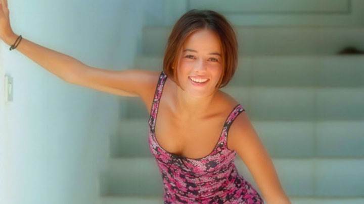 Alizee Jacotey Standing Near Stairs