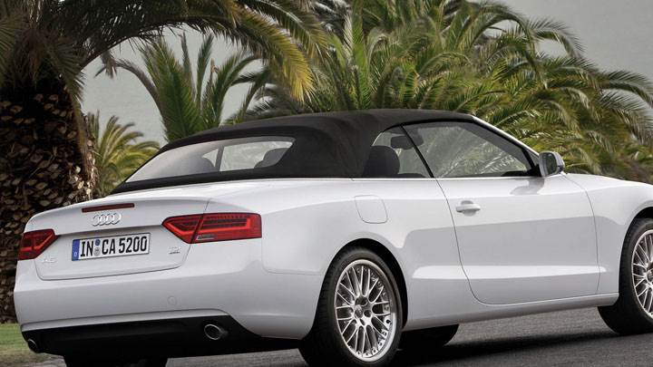Audi A5 Cabriolet in White Side Back on Road