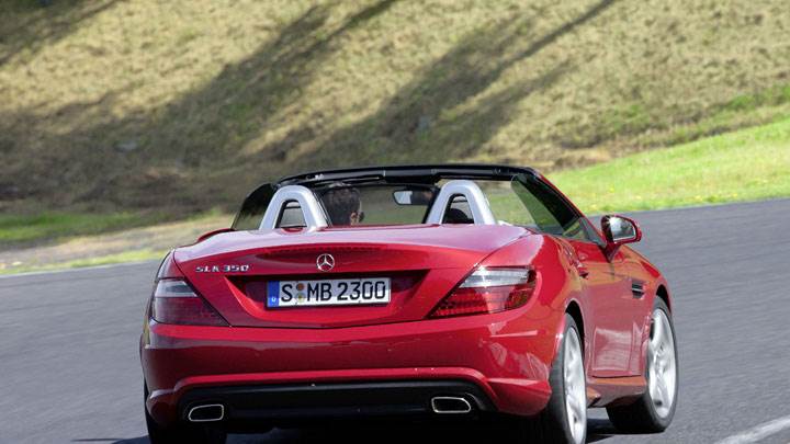Back Pose of Red Mercedes-Benz SLK 350 On Highway
