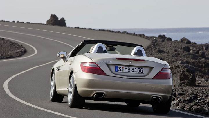 Back View of Golden Mercedes-Benz SLK 350 on Highway
