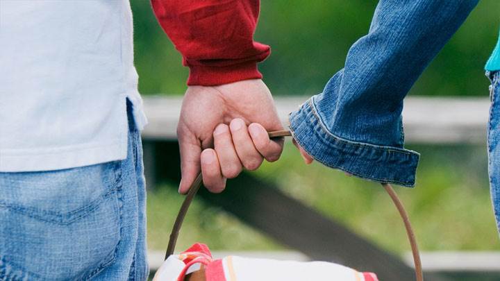 Couple Holding A Bucket
