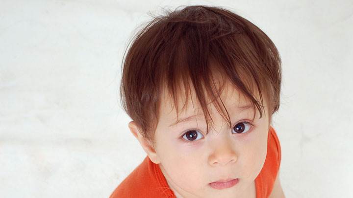 Cute Child In Orange T-Shirt