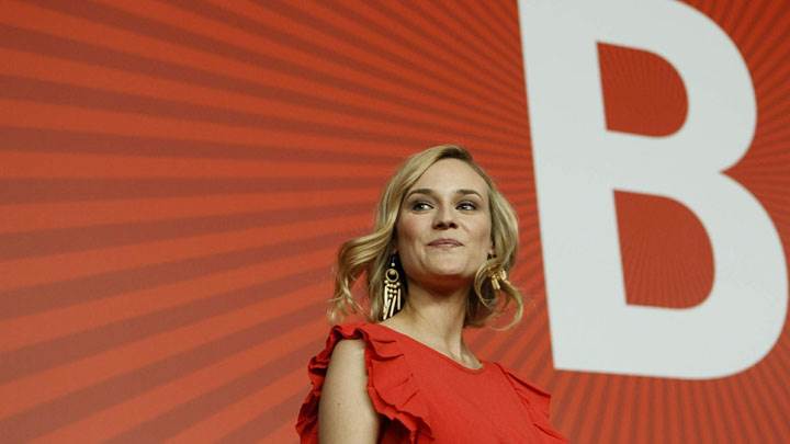 Diane Kruger Smiling In Red Dress And Background