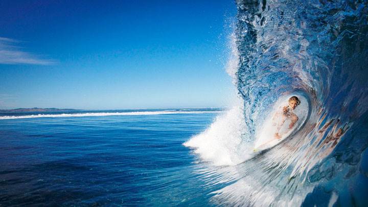 Female Surfer In Sea