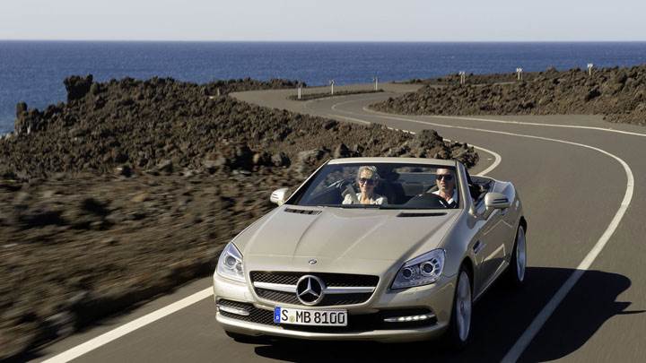 Golden Mercedes-Benz SLK 350 Running On Highway