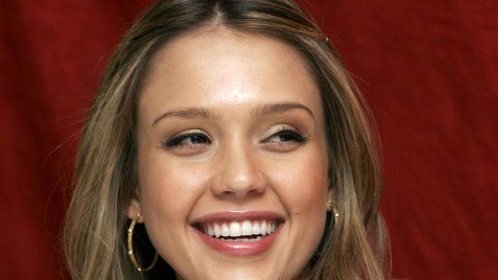 Jessica Alba Laughing Face Closeup And Red Background