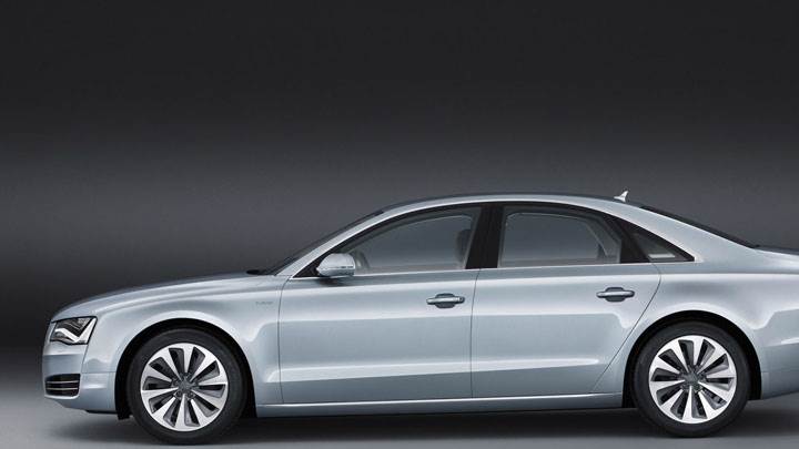 Side Pose of 2012 Audi A8 Hybrid In Green