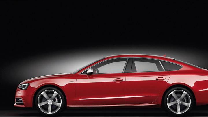 Side View of Red 2012 Audi S5 Sportback