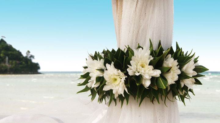 Wedding Flowers On Curtains Near Beach