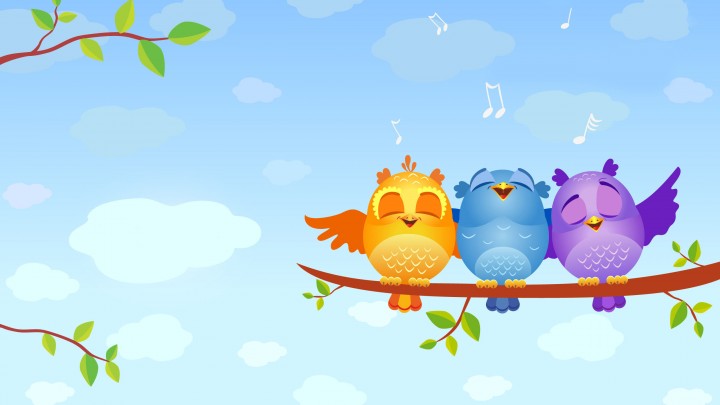 Colourful Birds Sitting On A Tree Branch And Singing