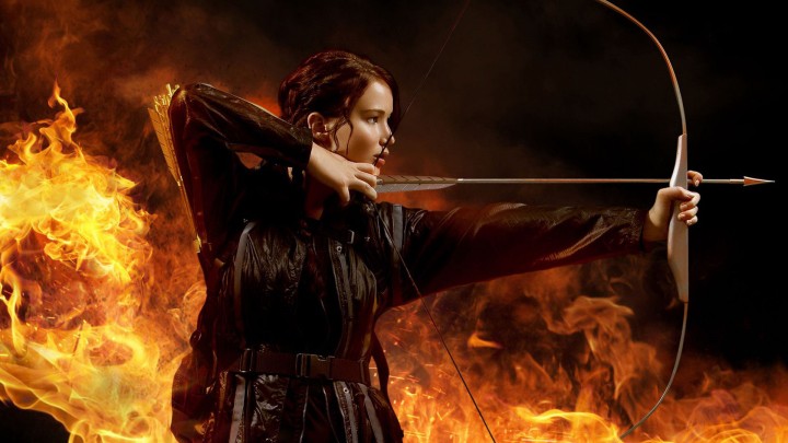 Katniss Everdeen With Her Bow Aiming At Something