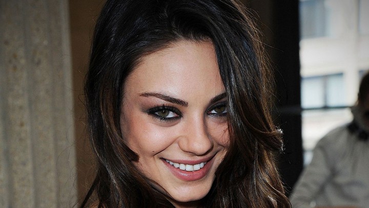 Mila Kunis Looking Scary With Her Smiling Look